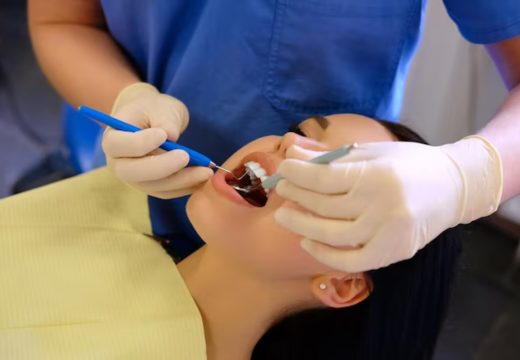 dentist checking the teeth